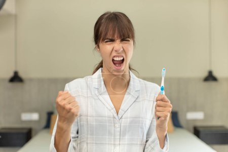 Photo for Young pretty woman looking angry, annoyed and frustrated. mouthwash concept - Royalty Free Image