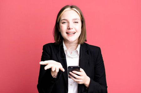 Photo for Young pretty businesswoman using her smartphone - Royalty Free Image