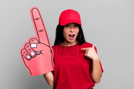 Photo for Hispanic pretty woman feeling happy and pointing to self with an excited. number one hand fan concept - Royalty Free Image