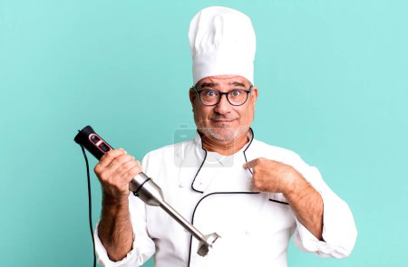 Photo for Middle age senior man feeling happy and pointing to self with an excited. restaurant chef with a tool concept - Royalty Free Image