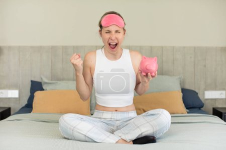 Photo for Looking angry, annoyed and frustrated. piggy bank concept - Royalty Free Image