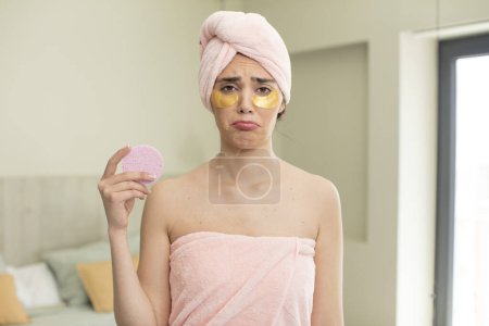 Photo for Pretty young model feeling sad and whiney with an unhappy look and crying. health and make up concept - Royalty Free Image