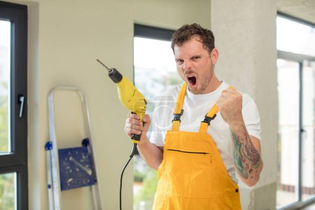 Photo for Looking angry, annoyed and frustrated handyman concept - Royalty Free Image