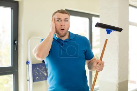 Photo for Feeling extremely shocked and surprised. windows washer - Royalty Free Image