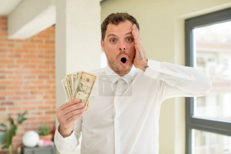 Photo for Feeling extremely shocked and surprised. dollar banknotes concept - Royalty Free Image