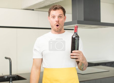 Photo for Feeling extremely shocked and surprised. bottle of wine concept - Royalty Free Image