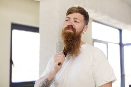 Téléchargez les photos : Jeune barbu homme barbe coupe concept - en image libre de droit