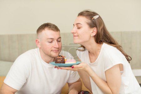 Photo for Young caucasian couple celebrating a birthday concept - Royalty Free Image