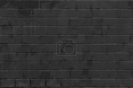 Téléchargez les photos : Texture ou fond de mur en brique noire - en image libre de droit