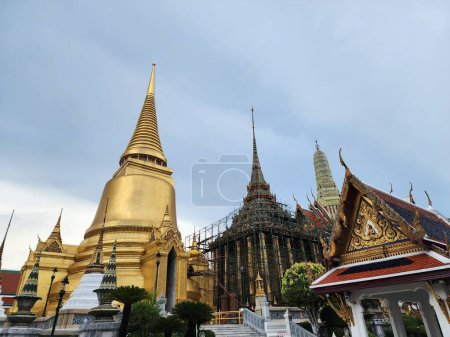 Photo for Wat Phra Kaew is an important royal temple in various royal ceremonies. Created in conjunction with the establishment of Rattanakosin Today it is a famous and popular place with tourists. - Royalty Free Image