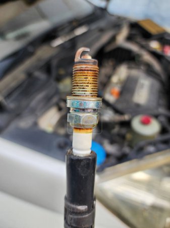 A car spark plug is a part of a gasoline engine. It has an important role as an ignition point in the engine system in automobiles. It should be changed when it expires.