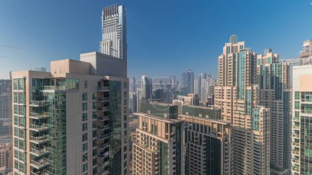 Téléchargez les photos : Panorama of downtown Dubai city aerial . Urban skyline with modern skyscrapers and towers construction site from above - en image libre de droit