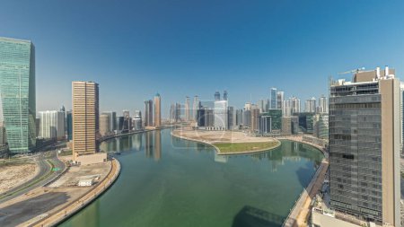 Photo for Panorama showing cityscape skyscrapers of Dubai Business Bay with water canal aerial . Modern skyline with towers and waterfront. A center of international business - Royalty Free Image