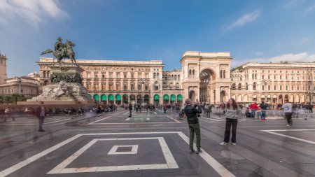 Téléchargez les photos : Panorama showing horse statue with Milan Cathedral and historic buildings timelapse. Duomo di Milano is the cathedral church located at the Piazza del Duomo square in Milan city in Italy - en image libre de droit