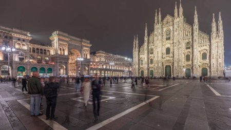 Photo for Panorama showing Milan Cathedral and historic buildings night timelapse. Duomo di Milano is the cathedral church located at the Piazza del Duomo square in Milan city in Italy - Royalty Free Image