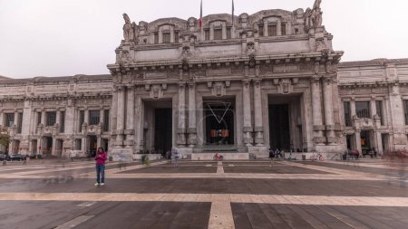 Photo for Panorama showing Milano Centrale timelapse - the main central railway station of the city of Milan in Italy. Located on Piazza Duca d'Aosta near the long boulevard Via Vittor Pisani. - Royalty Free Image