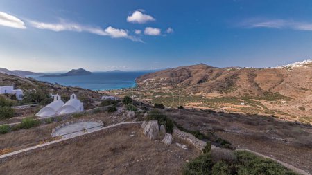 Photo for Panorama showing Amorgos island aerial timelapse from above. Traditional Greece - white houses on hills and turquoise sea, Cyclades - Royalty Free Image