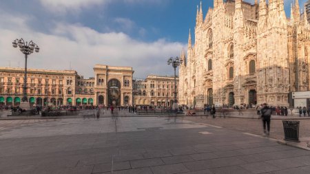 Photo for Panorama showing Milan Cathedral and historic buildings timelapse. Duomo di Milano is the cathedral church located at the Piazza del Duomo square in Milan city in Italy - Royalty Free Image