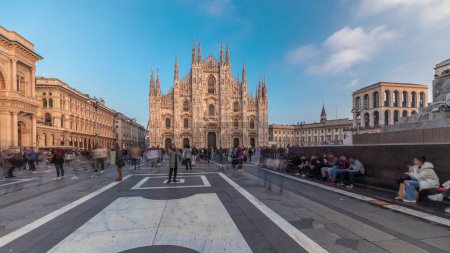 Photo for Panorama showing historic buildings and Milan Cathedral timelapse. Duomo di Milano is the cathedral church located at the Piazza del Duomo square in Milan city in Italy - Royalty Free Image