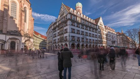 Photo for Kaufingerstrasse, shopping street and pedestrian zone in Munich downtown near the Marienplatz timelapse. Panorama of historic buildings with people walking around. Bavaria, Germany - Royalty Free Image