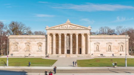 Glyptothek museum in Munich timelapse, commissioned by the Bavarian King Ludwig I to house his collection of Greek and Roman sculptures, neoclassical style. Clouds on a blue sky. Germany