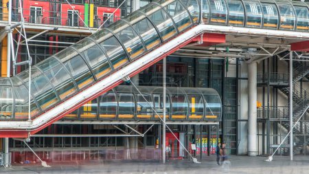 Photo for Tube with escalator going up of the Centre of Georges Pompidou timelapse in Paris, France. The Centre of Georges Pompidou is one of the most famous museums of the modern art in the world. - Royalty Free Image