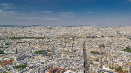 Photo for Top view of Paris skyline from above timelapse. Traffic on streets and avenues. Main landmarks of european megapolis. Bird-eye view from observation deck of Montparnasse tower. Paris, France - Royalty Free Image
