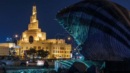 Qatar Islamic Cultural Centre night timelapse in Doha, Qatar, Middle-East. Traffic on the road. View from Corniche tote bag #707668626