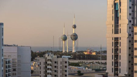 Photo for The Kuwait Towers timelapse - the best known landmark of Kuwait City. Aerial view with gulf on background before sunset. Kuwait, Middle East. - Royalty Free Image