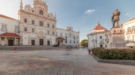 Panorama showing Sa da Bandeira Square with a view of the Santarem See Cathedral aka Nossa Senhora da Conceicao Church timelapse, built in the 17th century Mannerist style. Walking area. Portugal