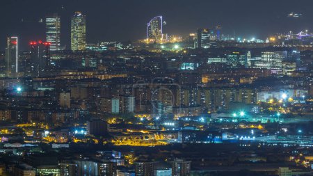 Barcelona and Badalona skyline with roofs of houses and sea on the horizon day to night transition timelapse after sunset. Aerial view from Iberic Puig Castellar Village viewpoint on top of hill