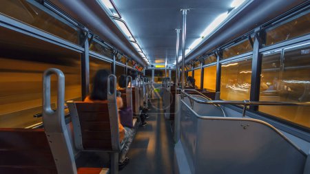 Photo for View inside interior of double-decker tram on street of HK drivelapse. Hong Kong Tramways is a tram system in Hong Kong, being one of the earliest forms of public transport in the metropolis. - Royalty Free Image