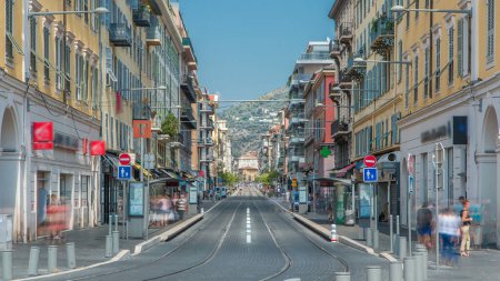 Photo for View of Place Garibaldi timelapse with trams on the street and traffic. It is named after Giuseppe Garibaldi, hero of Italian unification. Place Garibaldi is monumental example of Baroque architecture - Royalty Free Image