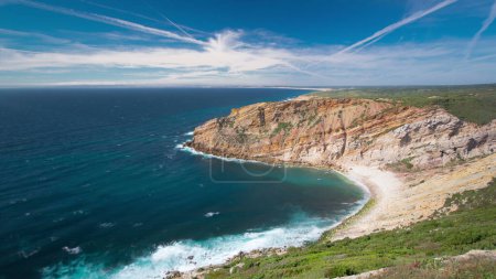View of the beautiful coastline with clouds near Cape Espichel, Sesimbra, Portugal timelapse. Shore of ocean