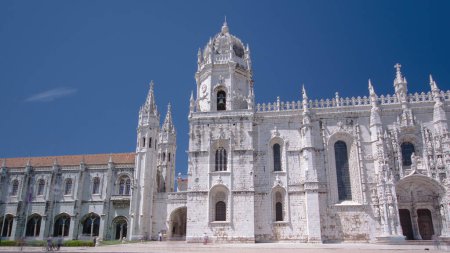 Photo for The Jeronimos Monastery or Hieronymites Monastery is located in Lisbon, Portugal timelapse hyperlapse with blue sky - Royalty Free Image