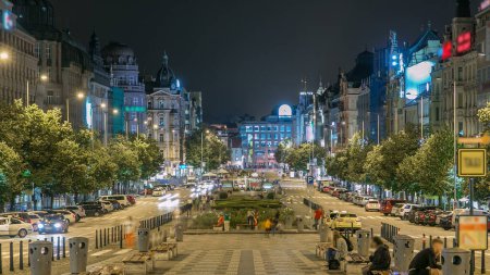 Photo for Wenceslas Square in Prague at night timelapse, dusk time, top view. Square is located in the center of Prague. Czech Republic. - Royalty Free Image