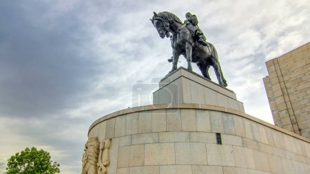 Equestrian Statue of Jan Zizka timelapse hyperlapse at Czech National Museum in Vitkov, Prague. This statue is the third largest bronze statue in the world. Cloudy day