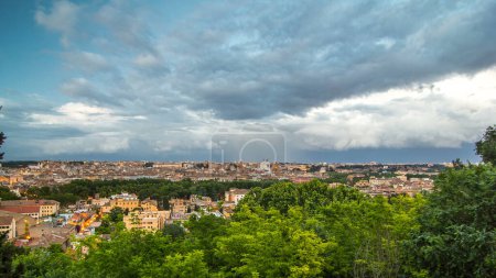 Photo for Panoramic aerial view of historic center day to night transition timelapse of Rome, Italy. Cityscape with heavy dramatic clouds after sunset - Royalty Free Image
