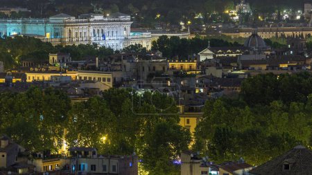 Photo for Panoramic aerial view of historic center night timelapse of Rome, Italy. Cityscape with Palace of Justice from top - Royalty Free Image