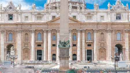 Photo for St. Peter's Square full of tourists with St. Peter's Basilica and the Egyptian obelisk within the Vatican City timelapse with tourists at summer day - Royalty Free Image