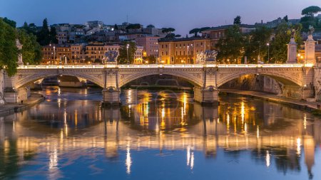 Photo for Ponte Vittorio Emanuele II is bridge across Tiber in Rome, Italy, architect Ennio De Rossi, connects historic centre of Rome with rione Borgo and the Vatican City, close to Roman Pons Neronianus. - Royalty Free Image