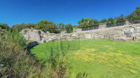 Photo for Albano Laziale's Anfiteatro Severiano Timelapse Hyperlapse, Italy. A Cinematic Journey Amidst Green Grass and Azure Skies, Capturing the Beauty of History - Royalty Free Image