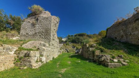 Photo for Timelapse Hyperlapse of Anfiteatro Severiano in Albano Laziale, Italy. Underneath the Blue Sky, Revel in the Green Grass of this Serene Italian Landscape - Royalty Free Image