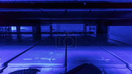 Photo for Special case with shelves where batteries are stocked for emergency relief if there are problems with the electricity grid timelapse hyperlapse. Data center power supply room - Royalty Free Image