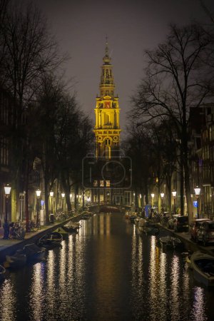 Photo for The Zuiderkerktoren in Amsterdam Center seen from the Staalmeestersbrug at night, the Netherlands - Royalty Free Image