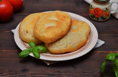 Photo for Homemade fried pies on a plate close-up - Royalty Free Image