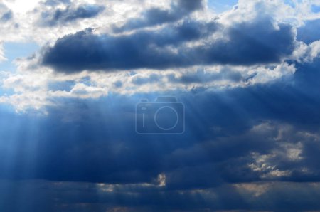 Photo for Sky before a thunderstorm with clouds and slanting rays - Royalty Free Image