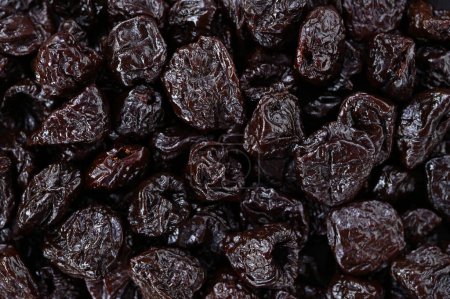 a lot of prunes dried fruits close-up