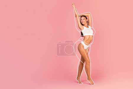 Photo for Weight Loss Concept. Happy Slim Beautiful Woman In Underwear With Drawn Outlines Around Her Body Posing On Pink Studio Background, Fit Young Female Raising Hands And Smiling, Copy Space, Collage - Royalty Free Image