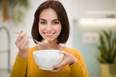 Photo for Healthy Weight Loss Food. Portrait Of Pretty Smiling Woman Having Oatmeal. Beautiful Young Lady Eating Fresh Yoghurt, Berries And Granola For Breakfast. Diet Nutrition Concept, Copy Space - Royalty Free Image